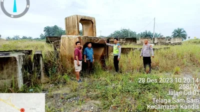 Kapolsek Tapung Hilir Gerak Cepat Antisipasi Jembatan Putus di Kota Bangun