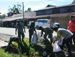 Bentuk Kepedulian Terhadap Lingkungan, Anggota Kodim 1710/Mimika Gelar Karya Bakti Di Pasar Jiliale