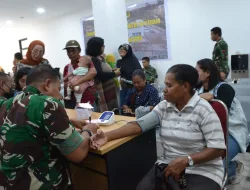 Kasdim Mimika Memimpin Kegiatan Baksos Pengobatan Gratis dan Pembagian Sembako