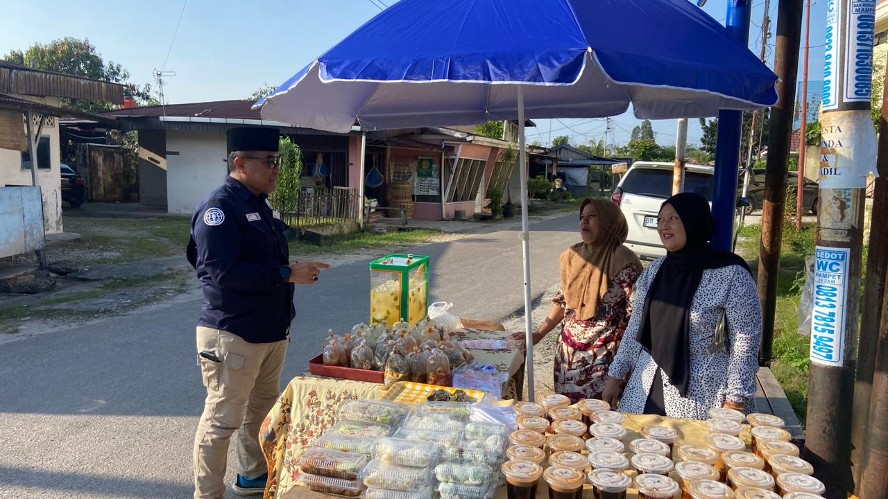Pimpin Patroli dan Pengamanan Pasar Tumpah, Kasi Humas Polresta Pekanbaru Ajak Masyarakat Jaga Kamtibmas